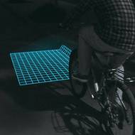 道路に光で格子模様を描く自転車用ライト「Lumigrids」